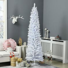 a white christmas tree in a living room