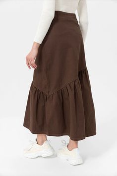 ◆ Asymmetric Layered Skirt ◆ 6 oz Lightweight Cotton ◆ Hidden zip ◆ A-Line ◆ Pair with a tank top or t-shirt for a casual look or dress it up with a cardigan or a sweater. SIZING The item comes in US Women's sizes 4-6-8-10. Our model is 5' 7'' (170 cm) and is wearing size 4.  The skirt length to the hem is 3' 1.5'' (95 cm). FABRICS & CARE * Fabric: 100% Cotton Denim * Care: Turn inside out before washing. Use warm hand wash or cold machine wash. Do not bleach, soak, rub, or tumble dry.  ◆ If you Spring Cotton Asymmetrical Cargo Skirt, Casual Asymmetrical Cargo Skirt For Spring, Brown Cotton Maxi Skirt For Spring, Spring Brown Cotton Maxi Skirt, Cotton Brown Maxi Skirt For Spring, Spring Asymmetrical Cotton Denim Skirt, Asymmetrical Cotton Skirt With Pockets, Casual Cotton Bottoms With Asymmetrical Hem, Brown Asymmetrical Maxi Skirt For Spring