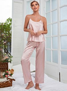 Product category: pajamasFabric name: silk-likeStyle: slingCollar type: V-neckSleeve length: sleevelessColor: navy blue, red, pinkSize: S,M,L,XL Pink Satin Home Sets, Pink Satin Loungewear Sets, Elegant Sleeveless Sleep Sets, Satin Cami Sleepwear For Loungewear, Sleeveless Satin Sleepwear For Loungewear, Pink Sleeveless Loungewear Sets, Solid Satin Camisole For Loungewear, Pink Sleeveless Set For Pajama Party, Pink Sleeveless Pajama Party Sets