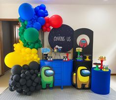 a party with balloons and decorations on the floor