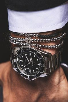 This stack works well together. And it looks clean and expensive, something men's jewelry doesn't always do. Mens Fashion Watches, Wrist Wear, Handcrafted Bracelets, Jewelry Style, Mens Leather Bracelet, Mens Fashion Trends, Fashion Jewellery, Jewellery Collection, Men's Accessories