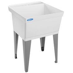 a white sink sitting on top of a metal stand