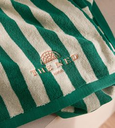 Towel Photography, Towel Aesthetic, Hotel Merch, Stripe Towel, The Ned, British Christmas, Surf Lodge, House Pool, Hotel Towels