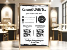 a table with a sign on it that says connect with us in black and white