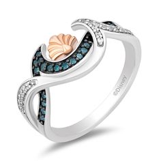 A captivating homage to the ocean's depths and the adventurous spirit that dwells within, this Ariel inspired ring is meticulously crafted with intertwined waves of white and blue diamonds. The white diamonds evoke the frothy crests, while the blue diamonds capture the serene depths, together creating a harmonious symphony of sea-inspired brilliance. Nestled between these waves lies a delicate rose gold seashell, a cherished emblem of Ariel's boundless curiosity and love for the sea. Its warm, i Ariel Jewelry, Ariel Seashell, Disney Princess Rings, Disney Princess Jewelry, Sea Ring, Seashell Ring, Sea Rings, Disney Rings, Ear Peircings