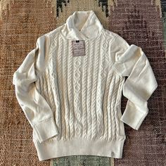 Brand New Old Ranch Cream Sweater With Classic Fisher Knit Design With Unique Neckline Fitted Winter White Sweater For Fall, Fitted Beige Sweater With Ribbed Collar, Beige Fitted Sweater With Ribbed Collar, Cozy Cable Knit Winter White Tops, Classic Cream Tops For Winter, Fitted Beige Cable Knit Sweater, Fitted Classic Sweater In Winter White, Winter Cream Tops With Ribbed Collar, Classic Fitted Winter White Sweater