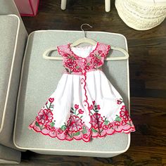 Stunning Linen Dress For A Beautiful Baby Girl. It’s Hand Crafted And Never Worn Once. I Got Two Dresses From A Boutique And This One Was Never Worn For Her First Birthday. It’s More Stunning In Person. Perfect For Summer Or Warm Days . I Would Recommend This For A One Year Old Baby Girl. Floral Embroidered Summer Dress For Playtime, Summer Floral Embroidered Playtime Dress, Summer Floral Embroidery Dresses For Playtime, Playful White Embroidered Dress, White Embroidered Dress For Holidays, White Embroidered Holiday Dress, White Summer Twirl Dress For Playtime, White Twirl Dress For Summer Playtime, White Cotton Holiday Dress