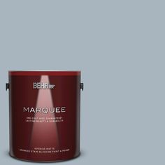 behr marquee interior paint in one gallon, with the light shining on it