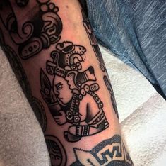 a person with a tattoo on their arm