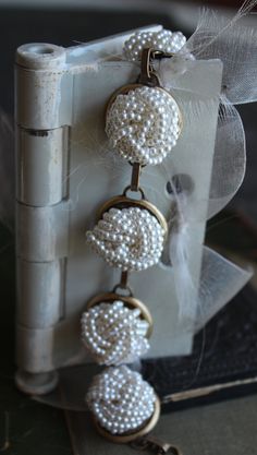 "How cool is this? Pefectly preserved pearly white bead clip on earrings, vintage 50's and 60's, make this a really fun bracelet, that definitely makes people take notice. This is a rich looking bracelet that can be dressed up or down. These earrings are harder to find than I thought they would be. But the hunt sure is fun. 7 1/2\" long. I work with antique and vintage parts. Some may show signs of wear or age. Please look at each picture closely. I have tried to show all aspects of my work. Ple Vintage Pearl Clip-on Earrings For Gift, Vintage Pearl Clip-on Earrings As Gift, Vintage Handmade Clip-on Earrings For Wedding, Handmade Adjustable Vintage Clip-on Earrings, Handmade Vintage Clip-on Earrings For Wedding, Vintage Pearl White Jewelry For Party, Vintage Adjustable Jewelry With Pearl Charm, Vintage Jewelry With Pearl Charm, Vintage White Dangle Pearl Earrings