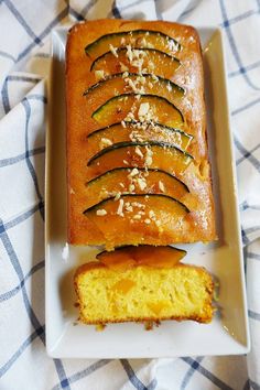 a loaf of bread with slices cut off on a plate