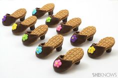 there are many small chocolate sandals with flowers on the bottom and one is made out of waffles