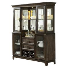 a wooden china cabinet with glass doors and drawers