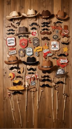 a wooden wall with many hats and mustaches on sticks attached to it's sides