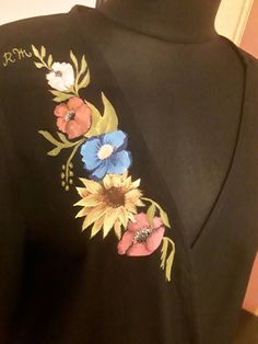 "Unique formal hand painted black blouse \"colorful flowers\", with elastic waist and a bow on the left side   Art for your heart - Imagine you can transform an ordinary blouse into a unique piece of art, using high quality colours.   Every product has an unique original painting, that you can not find anywhere else.   Personalisation is possible.   Fabric: 100% viscose. Colour : black Size : L   Heigh: 56 cm / 22 inch Bust: 94 cm / 38 inch Shoulders: 43 cm / 17,5 inch Sleeve lenght: 62 cm / 24, Artistic Black Tops For Spring, Fabric Paint Designs, Blouse Models, Embroidery Blouse Designs, Blouse Pants, Embroidery Blouse, Stylish Dress Designs, Fabric Painting, Black Paint