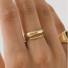 Two bands, cast from hand-sculpted wax models in the “Squiggle” silhouette, are perfectly made to stack with each-other or worn separately.  Crafted to be enjoyed and admired, these two-tone rings will bring an artful and unique touch to any outfit. High polished to a high gloss in this bold, elegant ring. Wear it all day in anticipation of an evening out; it will not go unnoticed. Materials: Silver: Stainless Steel. Gold: 18K Gold Vermeil Stainless Steel 100% Eco-Friendly; No Nickel, Chromium and Lead  Water-resistant, sweat-proof, hypoallergenic and tarnish-free. You can work out in our durable jewelry, wear it to the beach, pool or even shower with it. Cheap Dainty Gold Rings, Gold Colour Ring, Plain Solid Gold Ring, Attic Gold Ring, Knuckle Rings Gold Simple, Genuine Gold Ring, Rings Gold Plain, Wode Gold Ring, Half Finger Rings Gold