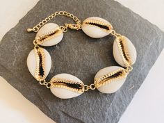 Natural Cowrie Shell Bracelet Gold Shell Chain Bracelet Summer Bracelet Gold Beach Bracelet Shell Gold Bracelet Mothers day Gift for Woman Gold Shell Bracelets For Gift, Elegant Shell-shaped Bracelet As A Gift, Elegant Gold Shell Bracelets, Handmade Gold Shell-shaped Bracelets, Cowrie Shell Bracelet, Birthstone Jewelry Mothers, Bohemian Handmade Shell-shaped Bracelets, Gold Medallion Necklace, Earring Fashion