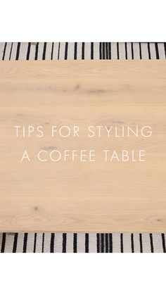 a wooden tray with the words tips for styling a coffee table