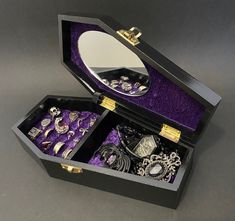 9 inch Coffin Jewelry Box, Velvet lined with mirror. This Coffin Jewelry Box can hold 10-to-18 rings, and has a 4 5/8'' x 2 3/4'' x 1 1/2'' cubby for miscellaneous pieces. Please select your velvet color: Red, Purple, Green, Pink, or Orange (Jewelry NOT included) Goth Jewelry Box Diy, Coffin Jewelry Box, Coffin Jewelry Box Diy, Goth Jewelry Box, Jewelry Box Ideas, Gothic Jewelry Box, 2000s Jewelry, Coffin Jewelry, Orange Jewelry