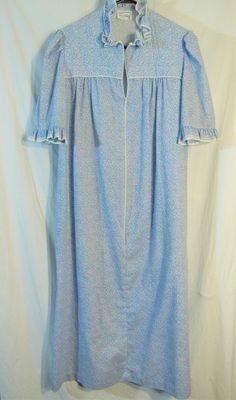 "Wow! Vintage 1980s JCPenney Blue/Pink Tiny Ditsy Floral Long Zip Step-In Robe! Soft Poly/Cotton, Gathered Lace, Half Sleeve  Features gathered collar and cuffs trimmed in lace and a quilted front yoke. Women's M Bust 40\" Unworn unwashed mint and smoke free! It's gorgeous! Please see our other listings for more vintage sleepwear with new items added daily. We love vintage Sears, Penneys, and more - please check out the store! PLEASE check the measurements as vintage clothing sizes may not compa Vintage Sleepwear, Half Sleeve Women, Womens Robes, Vintage Textiles, Sleeves (women), Ditsy Floral, Vintage Wool, Collar And Cuff, Half Sleeve