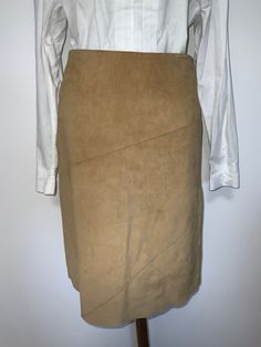 Beautiful tan pencil leather skirt from Benetton , closes with a zipper on back very good condition. Measurements  waist 74 cm Length 59 cm Size on label is  Italian 42  Hips aprox 95 cm Fits a modern S M Beautiful eclectic piece. Fully lined  Excellent vintage condition Tan Leather Skirt, Skirt Office, Beige Skirt, Office Skirt, Rose Shop, Leather Pencil Skirt, Heart Button, Stunning Dresses, Vintage Leather