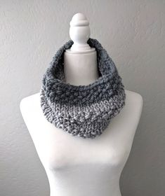 Introducing the cozy and stylish gray hand knit cowl, the perfect accessory to keep you warm and fashionable during those chilly days! Handcrafted with love and attention to detail, this cowl is a must-have addition to your winter wardrobe.  This handmade winter accessory is not only fashionable but also functional. It shields you from the cold while adding a touch of elegance to your ensemble, making it an essential accessory for winter. Looking for a thoughtful gift for your loved ones? This cozy handmade neck warmer makes for a heartwarming present, showcasing your care and consideration for their style and comfort. Perfect for Christmas, birthdays, special occasions, or that "hard to shop for" person in your life.  Make a statement this winter with a one-of-a-kind knitted scarf. Stay w Cozy Gray Winter Knitting Pattern, Cozy Gray Chunky Knit Pattern, Cozy Gray Knitted Knitting Pattern, Cozy Gray Knitting Pattern, Casual Hand Knitted Gray Knitting Pattern, Casual Gray Hand Knitted Pattern, Womens Circle, Flagstaff Az, Women's Circle