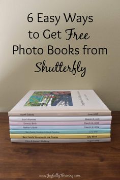 a stack of books with the title 6 easy ways to get free photo books from shutterfly