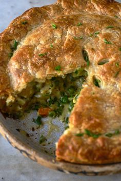 a close up of a pie on a plate