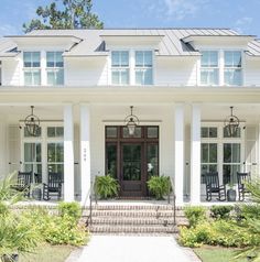 a large white house with columns and windows