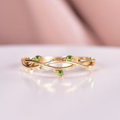 ☆Ring Details☆ Material: 14K Yellow Gold (Hypoallergenic, Nickel Free, Tarnish Resistant) Material: Solid 10K/14k/18k Rose Gold/White Gold/Yellow Gold (PLEASE choose silver or platinum if you are allergic to nickel.) ☆Engagement Ring -Center Stone: Peridot -Shape: Round -Size: 1.5mm ☆Service Available☆ ☆Rush Order ☆Payment Plan ☆Engrave Service (should be less than 10 letter) ☆Customized Available ☆14 Days Return Policy ☆Ring Size☆ Sizes available: 3-9 (Larger and smaller sizes are available. Pl Green Peridot Promise Jewelry, Green Peridot Jewelry For Promise, Yellow Gold Peridot Stackable Rings For Anniversary, Wedding Stackable Peridot Rings With Birthstones, Green Crystal 14k Gold Wedding Ring, Green Birthstone Ring Fine Jewelry For Wedding, Green Crystal Wedding Ring In 14k Gold, Green Crystal 14k Gold Ring For Wedding, Green 14k Gold Crystal Wedding Ring