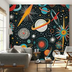 an image of a living room scene with space wallpaper