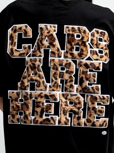 Short sleeve crew neck t-shirt Faux leopard fur lettering on the back Digital print crew photo on the front 100% Cotton Imported Officially licensed Jersey Shore merchandise The models are wearing medium tees. Leopard Print Short Sleeve Top For Streetwear, Short Sleeve Leopard Print Tops For Streetwear, Graphic Tee With Crew Neck In Leopard Print, Graphic Tee With Leopard Print And Crew Neck, Leopard Print Graphic Tee For Streetwear, Leopard Print Graphic Tee With Crew Neck, Cabs Are Here Jersey Shore, Cabs Are Here, Leopard Print Graphic Tee With Lettering