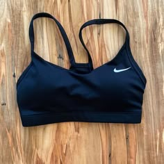 Nike Sports Bra. Padded. Cute Keyhole Back Design. Padded. Never Worn, Without Tags. Excellent Condition Nike Sports Bra Aesthetic, Nike Sports Bra Outfit, Black Sports Bras, Nike Bras, Cute Sports Bras, Nike Sports Bras, Gym Tops Women, Sports Bra Collection, Nike Bra