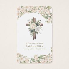 a white card with flowers and a cross on the front reads, in loving memory of carol henry