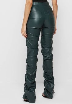 Back in stock! Elevate your wardrobe with our Trinity Faux Leather Pants. These ruched, faux leather pants exude a chic and exclusive vibe, while the fit and flare design flatters your figure. Add a touch of sophistication and luxury to any outfit with these must-have pants. Details: High waist, front zipper, fit and flare, ruched Size Chart: Small: Waist 26, Hip 33, Length 42Medium: Waist 27, Hip 35, Length 43Large: Waist 29, Hip 36, Length 43X-Large: Waist 30, Hip 38, Length 442X-Large: Waist 32, Hip 40, Length 44Model size small 5'8" 36-26-38 Made In: China Fabric Contents: Polyester Top Wedding Dresses, Leather Pant, Costume Intero, Bungee Cord, Flare Trousers, Leather Trousers, Adjustable Waistband, Faux Leather Pants, Care Label