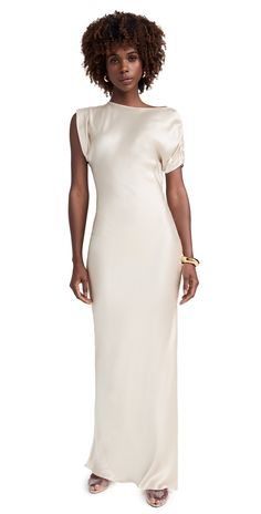 Find AMANDA UPRICHARD Elroy Silk Maxi Dress on Editorialist. Fabric: Lightweight, non-stretch silk charmeuse. Bias cut for slight stretch. Maxi length. Off-shoulder neckline. Short sleeve. Pullover design, no closure. Shell: 100% silk. Unlined. Dry clean. Imported, China. Measurements: Measurements from size XS Length: 62.25in / 158.0cm, from shoulder Bias Cut Dress With Sleeves, Chic Fitted Silk Sheath Dress, Chic Fitted Sheath Silk Dress, Fitted Silk Dress With Draped Sleeves, Elegant Silk Sheath Midi Dress, Elegant Fitted Sheath Silk Dress, Elegant Fitted Silk Crepe Midi Dress, Fitted Silk Dress With Bias Cut For Dinner, Chic Formal Sheath Silk Dress