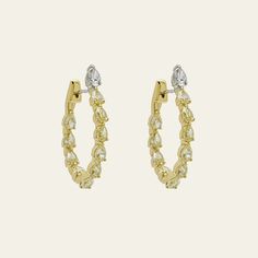 You will be radiant in our Pear-Shaped Yellow Diamond Hoop Earrings. A single pear-shaped white diamond sits at the ear lobe, then gives way to a cascade of pear-shaped fancy yellow diamonds. These hoops are an inside-out style, meaning diamonds line the inner edge, creating so much sparkle and shine. Your other hoops will be jealous of this jaw-dropping pair. Yellow Diamond18K Yellow Gold4.89 Carats of Pear-Shaped Fancy Yellow Diamonds0.61 Carats of Pear-Shaped White Diamonds White Diamond18K W Inside Out Style, Yellow Diamonds, Fancy Yellow Diamond, Gold Statement Earrings, Sparkle And Shine, Bespoke Jewellery, Diamond Hoop Earrings, Pear Shaped Diamond, Yellow Diamond