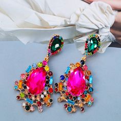 Rhinestone earrings-New Bohemia Colorful Crystal Drop Earrings High Quality Fine Geometric Rhinestones Dangle Earrings for Women Jewelry Party Gift Style: TRENDY Shape\pattern: Moon Metals Type: Zinc alloy Material: CRYSTAL Item Type: Earrings Gender: Women Fine or Fashion: Fashion Earring Type: Drop Earrings Model Number:3256803983352609 Condition: 100% Brand New And High Quality Color:As The Picture Material: Rhinestone Shopping Note :As different computers display colors differently, the color of the actual item may vary slightly from the above images, thanks for your understanding Water Drop Earrings, Crystal Drop Earrings, Crystal Drop, Rose Earrings, Rhinestone Earrings, Water Drop, Jewelry Party, Crystal Items, Shape Patterns