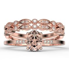 two rose gold wedding rings with an oval cut diamond in the center and white diamonds on each band