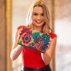 Embrace a wonderland of fun and style with this crossbody handbag. Featuring a playful rainbow of beaded & embroidered flowers on a soft leather body, this bag will add a pop of happiness to your wardrobe. Don't forget the matching Wonderland Wallet. 8.25 x 1.75 x 5.5" Strap Length End to End: 49" Strap Drop: 23.5" Removable crossbody chain strap with beaded leather shoulder piece Magnet closure Inside pocket Back pocket Contains leather Fits a phone Includes: metal logo fob, protective storage Multicolor Embroidery Crossbody Shoulder Bag, Multicolor Clutch Shoulder Bag, Colorful Shoulder Bag For Gift, Shoulder Piece, Big Handbags, Mary Frances, Best Handbags, Handmade Purses, Top Handle Handbags