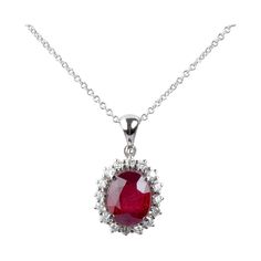 18 carat white gold necklace designed with 1 oval ruby weighing 3.31 carat and 16 round brillant cut diamonds weighing 0.40 carat in total. Qualité du diamant Couleur : F - G Clarté : VS - SI Weight: 5.54 gr. Dimensions : 45 x 0.10 cm Dimensions of the pendant : 2.10 x 1.20 x 0.80 cm Jewel delivered with a luxurious box and its International AIG certificate. Condition : Like new 18 carat gold eagle head hallmark on the jewel. Secure and express delivery within 24 to 48 hours. Oval Ruby Necklace With Brilliant Cut, White Gold Ruby Necklace With Brilliant Cut, White Gold Ruby Necklaces With Brilliant Cut, Formal Ruby Necklace With Halo Setting, White Gold Oval Ruby Necklaces, Oval Ruby Necklaces In White Gold, Ruby Diamond Necklace, Ruby And Diamond Necklace, Diamonds Necklace