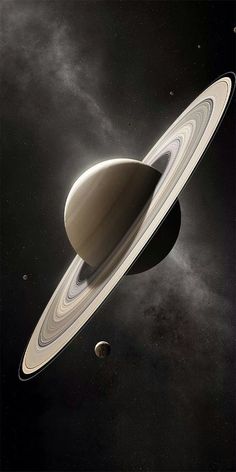 an artist's rendering of saturn and its two satellites in the outer solar system