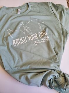 a t - shirt that says brush your dog's teeth