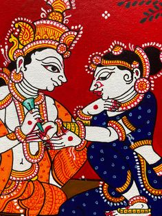 an artistic painting on the wall of a temple depicting two women playing with each other