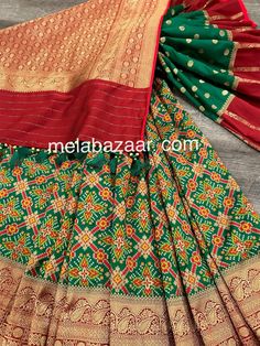 *Fine Silk Patola Saree! *Glamorous saree in green with patola weaving all throughout and Banarsi border *Matching blouse fabric included *Fall attached and designer tassels on the palla Note: The color of the products may slightly vary according to the ambient lighting conditions and the color calibration of LED devices. If you would like more clarity before your purchase, please drop us a message . Transitional Green Art Silk Sharara, Green Art Silk Sharara With Cutdana, Green Blouse Piece With Cutdana For Transitional Season, Transitional Green Blouse Piece With Cutdana, Green Paithani Silk Pre-draped Saree With Self Design, Transitional Season Green Choli With Cutdana, Green Chanderi Choli For Transitional Season, Festive Green Pre-draped Saree With Pallu, Festive Green Paithani Silk Pre-draped Saree