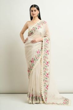 Ivory organza saree with multi colored thread work floral embroidery and scalloped borders. Comes with unstitched blouse piece. - Aza Fashions Organza Saree With Floral Embroidery For Reception, Reception Organza Saree With Floral Embroidery, White Floral Embroidered Pre-draped Saree For Wedding, Off White Traditional Wear With Floral Embroidery For Reception, Off White Floral Embroidered Traditional Wear For Reception, White Floral Embroidered Chanderi Pre-draped Saree, White Georgette Pre-draped Saree With Floral Embroidery, Designer White Pre-draped Saree With Floral Embroidery, White Tissue Silk Traditional Wear With Floral Embroidery