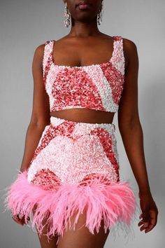 "Get glam in our Pink Sequin Swirl Bow Back Crop Top. This piece has an all-over two-tone pink and white sequin swirl motif design. The fabric is stretchy and has a tie-back for easy wearing. Perfect for your special events such as a birthday, wedding events, date nights, and much more. Pair it with our matching Pink Sequin Feather Shorts >>https://www.etsy.com/listing/1464882266/pink-white-sequin-feather-shorts Details Crop Top: Stretch  Shell Fabric Content: Nylon/Spandex Lining Content: Polye Feather Shorts, Bride Jumpsuit, Party Crop Tops, Party Rompers, Get Glam, Sequin Crop Top, Sequin Shirt, Coachella Outfit, Sequin Bow