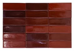 a close up view of a red tile wall