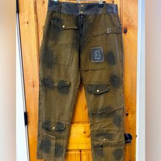 Brand New With Tags. Size 7: Med/Large. Distressed Relaxed Fit Pants For Fall, Relaxed Fit Distressed Pants For Fall, Distressed High Waist Grunge Pants, Grunge Wide Leg Distressed Pants, High Waist Distressed Grunge Pants, Cotton Grunge Bottoms With Cargo Pockets, Grunge Cotton Bottoms With Cargo Pockets, Baggy Grunge Washed Pants, Vintage Distressed Pants For Fall