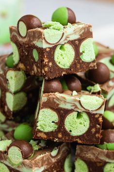 there are many pieces of chocolate and green candy